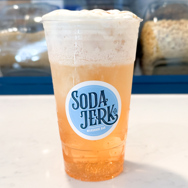 Peaches & Cream Whiz Bang Soda in a Soda Jerk cup.