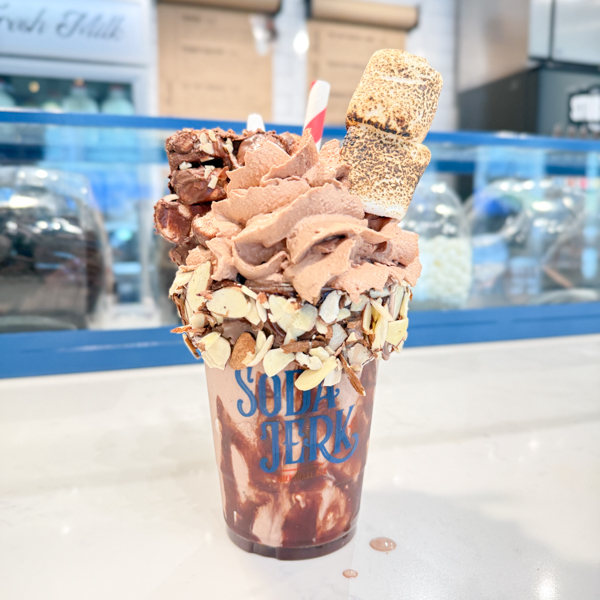 It's a Rocky Road Killer Shake in a Soda Jerk cup sitting on the Soda Jerk counter.