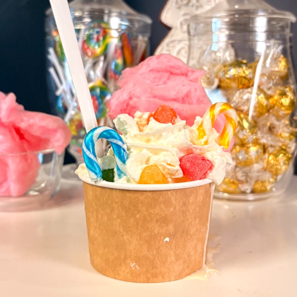 Santa's Sweet Shop sundae surrounded by candy.