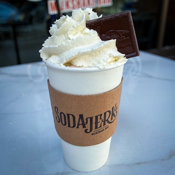 Caramel hot chocolate in a Soda Jerk cup.